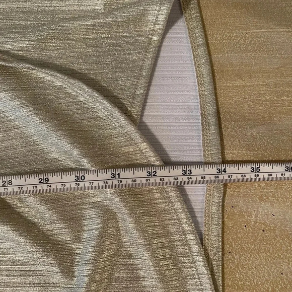 Fashion Nova metallic gold bodycon dress with tulip flap detail in front. - Picture 10 of 11